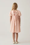 Rochie Sia roz – spatele cu decupaj legat cu două funde